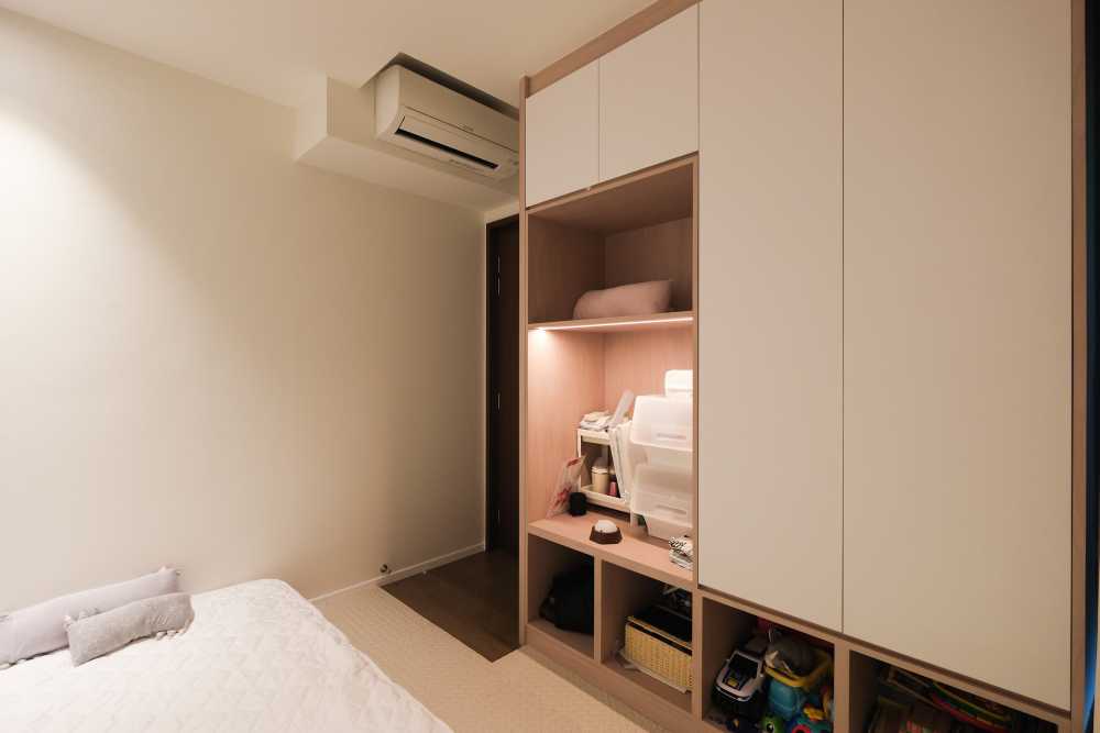 Minimalist Bedroom with Wardrobe and Children's Storage
