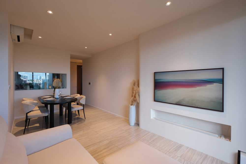 Minimalist Living Room with Feature Wall and Dining Table