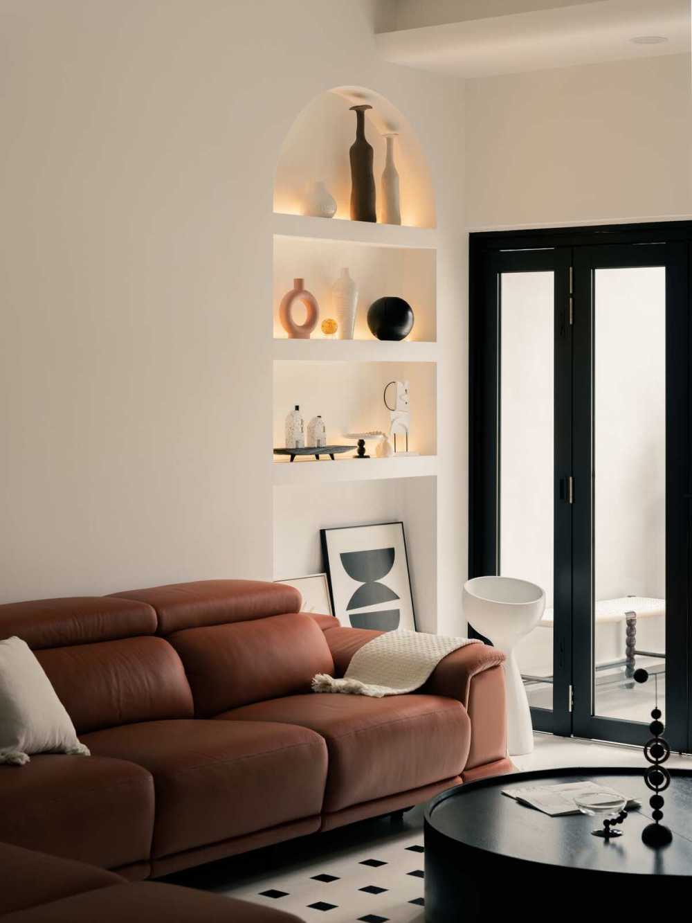Minimalist Living Room with Feature Wall and Cove Lighting