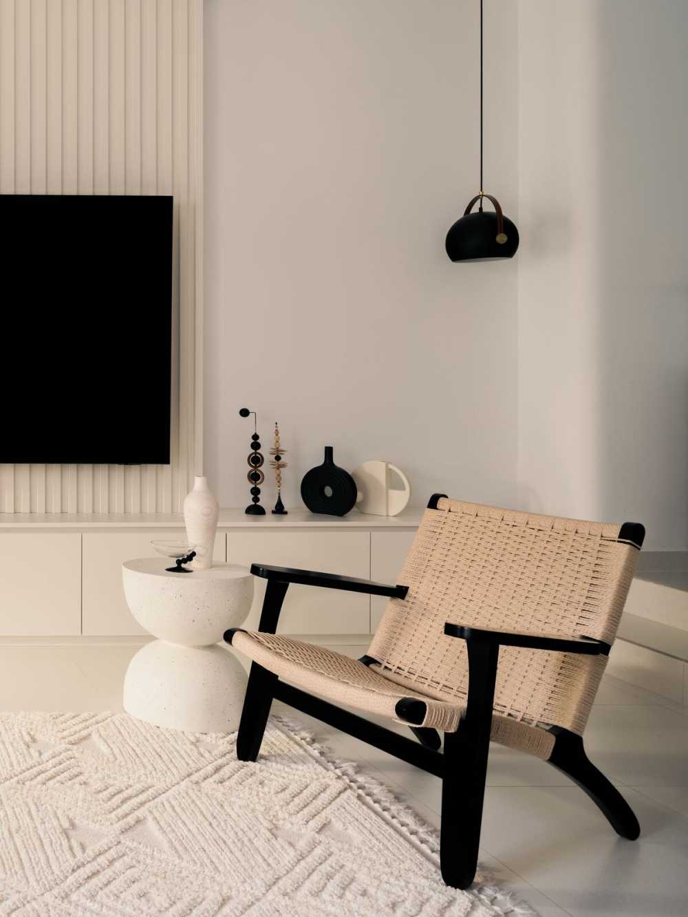 Minimalist Living Room with Homogeneous Tiles and TV Console