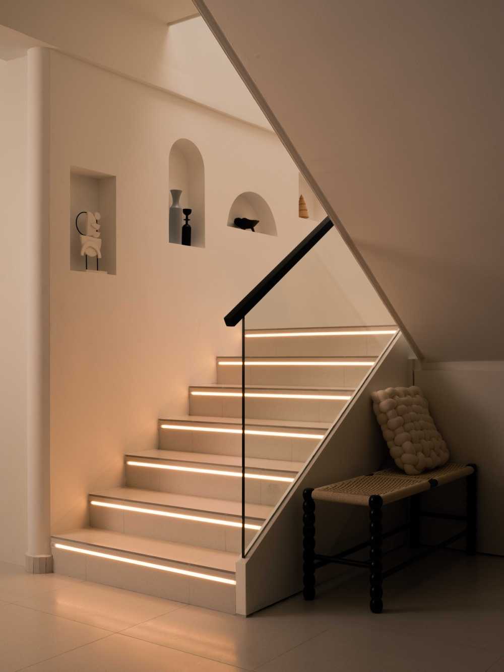 Minimalist Hallway with Bookshelf and Artwork