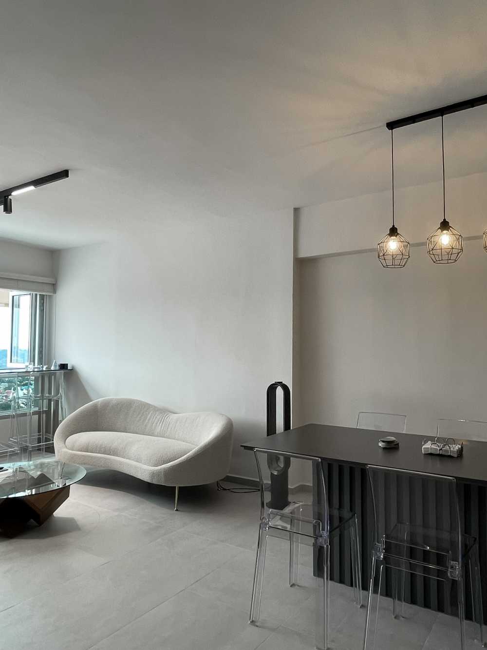Modern Living Room with Homogeneous Tiles and Feature Wall