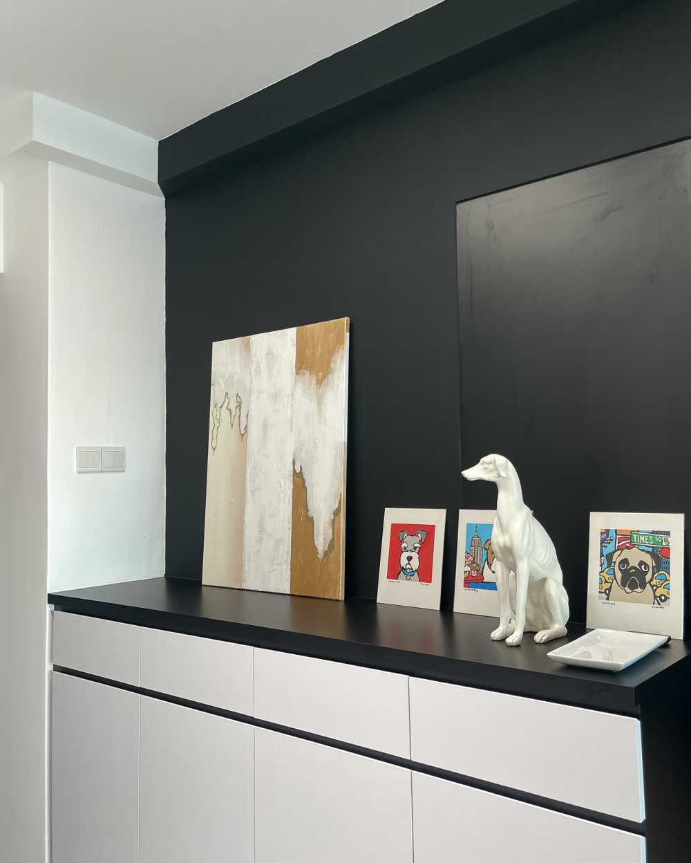 Modern Foyer with Artwork and Shoe Rack