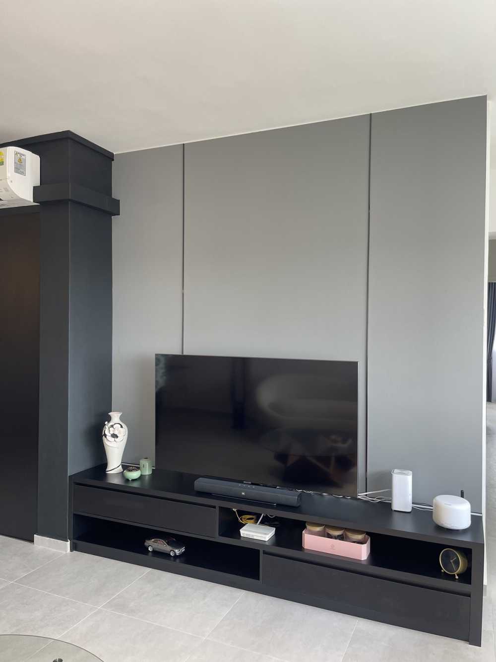 Modern Living Room with Homogeneous Tiles and TV Console