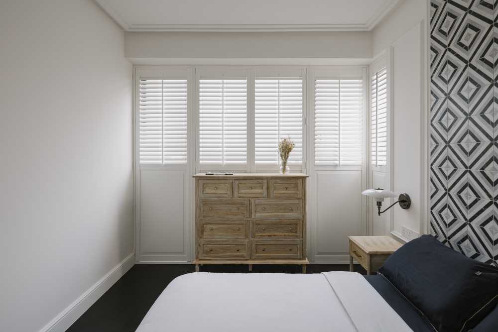 Modern Bedroom with Feature Wall and Window Shutters