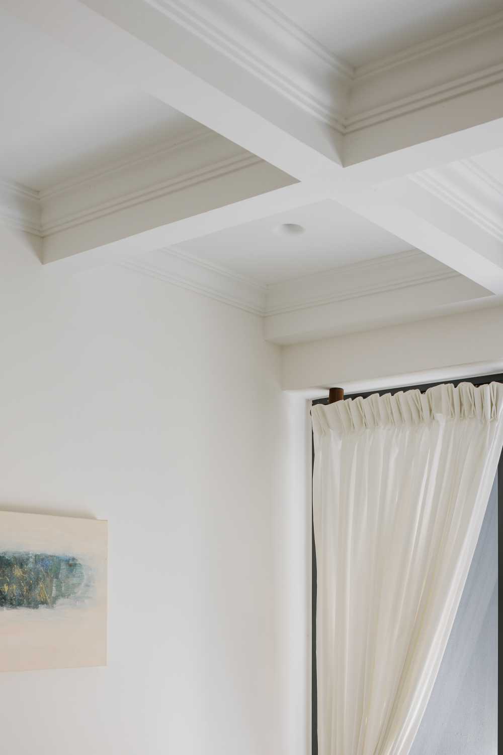 Modern Living Room with Drop Ceiling and Artwork