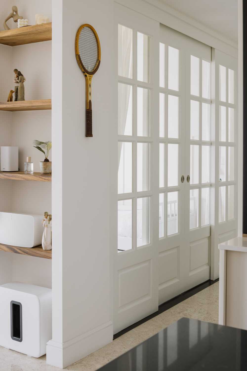 Modern Hallway with Marble Floor and Feature Wall