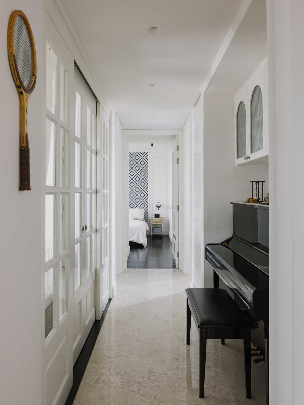 Modern Hallway with Marble Floor and Storage Cabinets