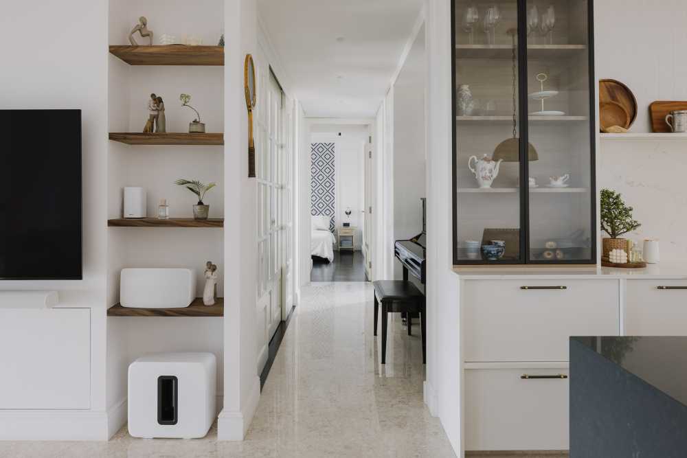 Modern Hallway with Marble Floor and Artwork