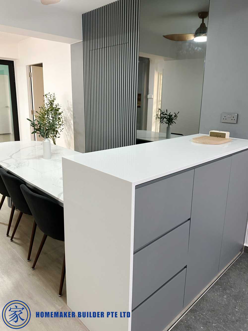 Contemporary Dining Room with Countertop and Feature Wall