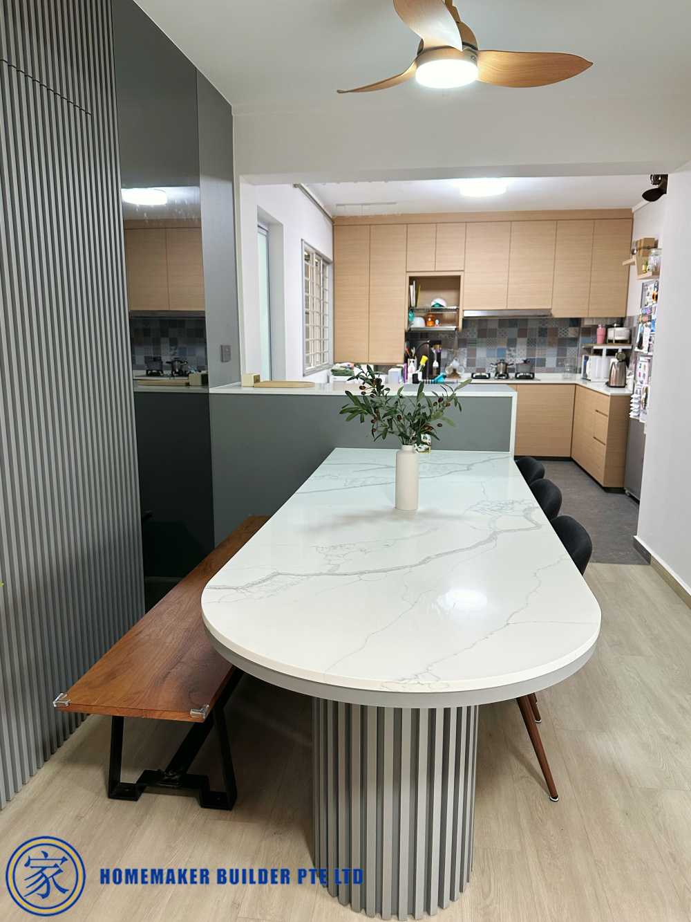 Contemporary Dining Room with Countertop and Feature Wall