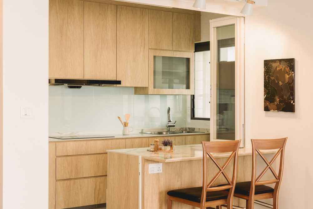 Scandinavian Kitchen with Herringbone Tiling and Wood Flooring