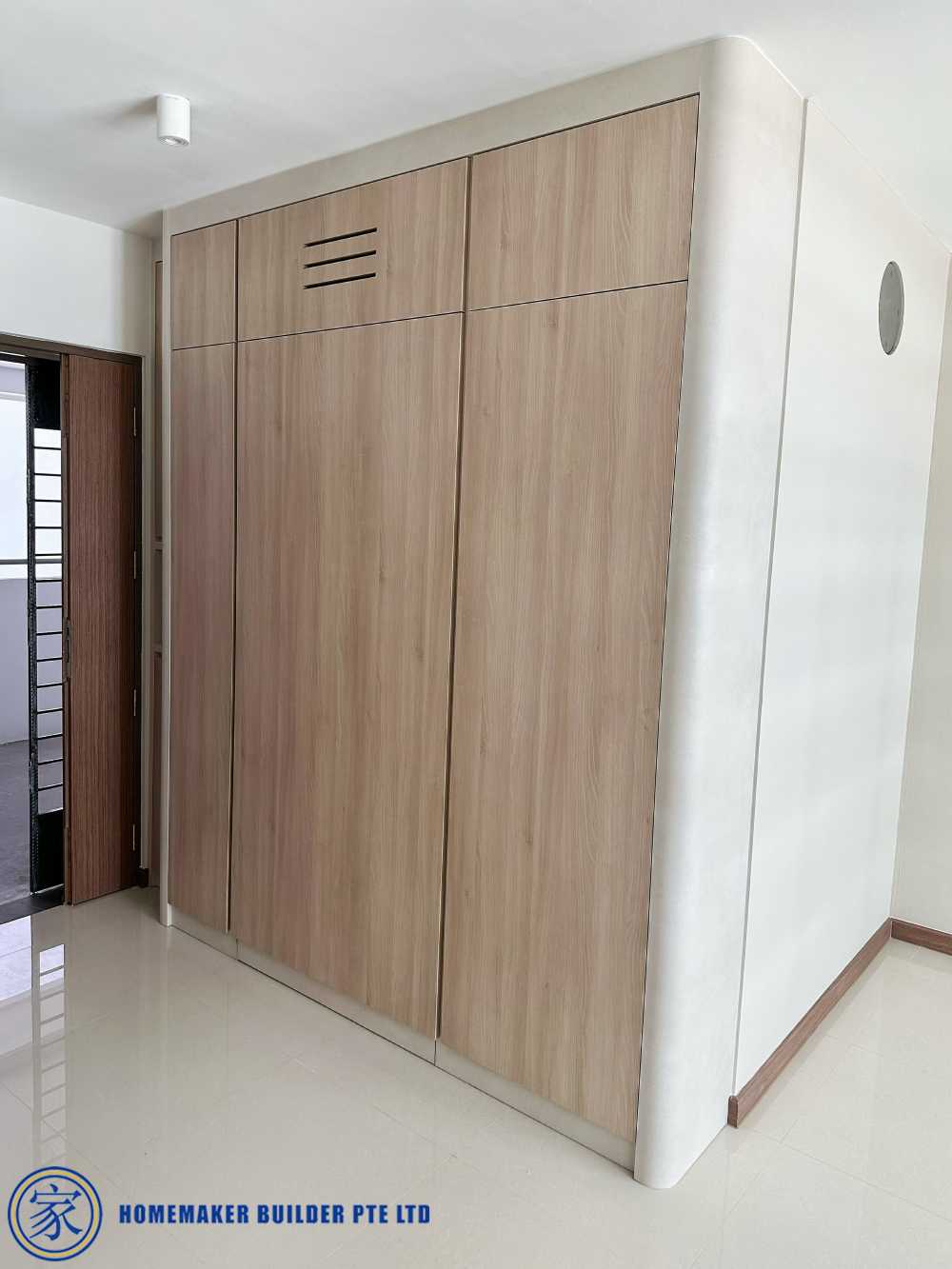 Scandinavian Foyer with Downlights and Storage Cabinets