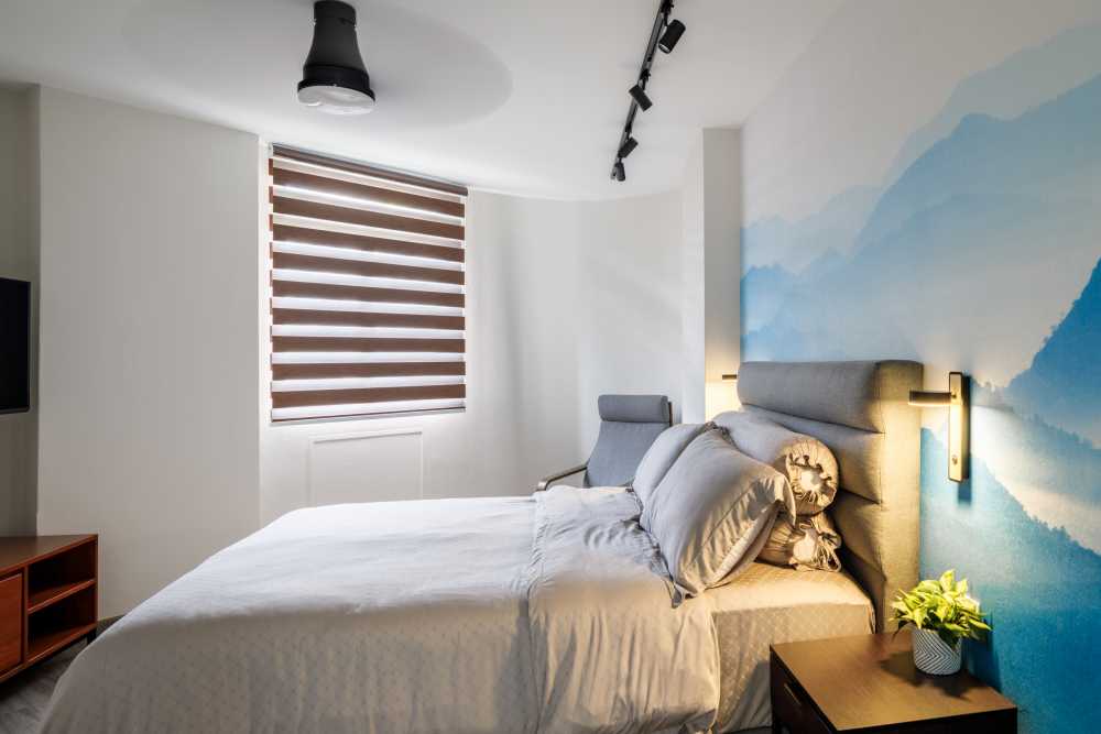 Modern Bedroom with Ceiling Light and Bed