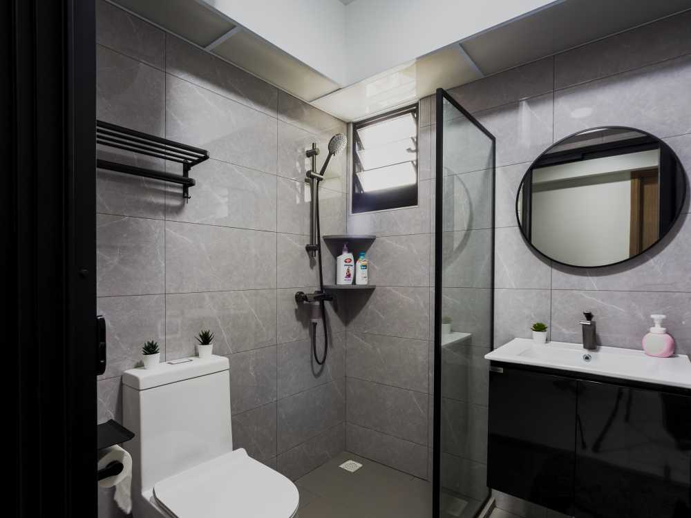 Minimalist Bathroom with Homogeneous Tiles and Mirror