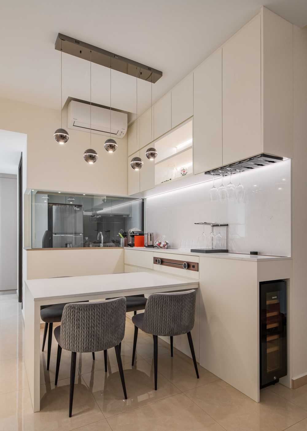 Contemporary Dining Room with Drop Light and Downlights