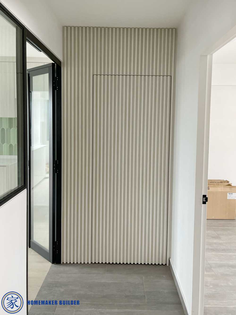 Minimalist Hallway with Homogeneous Tiles and Feature Wall