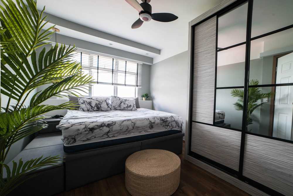 Industrial Bedroom with Platform Bed and Wood Flooring