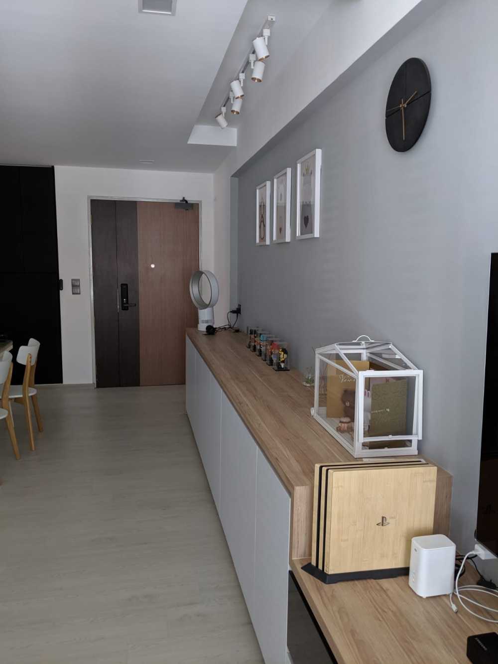 Scandinavian Hallway with Bookshelf and Artwork