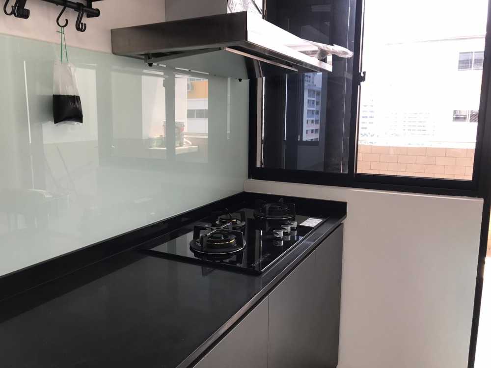 Minimalist Kitchen with Countertop and Homogeneous Tiles