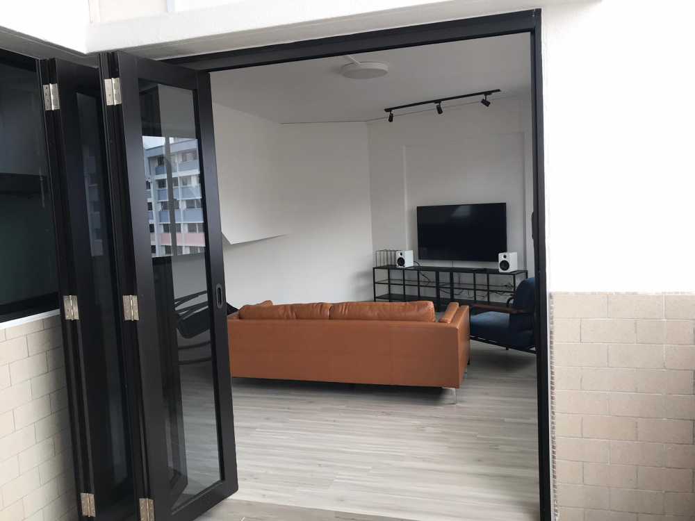 Minimalist Living Room with Vinyl Flooring and Paintings