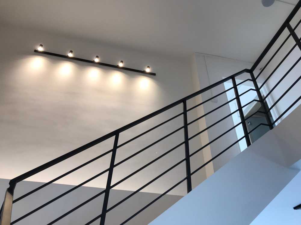 Minimalist Hallway with Artwork and Paintings