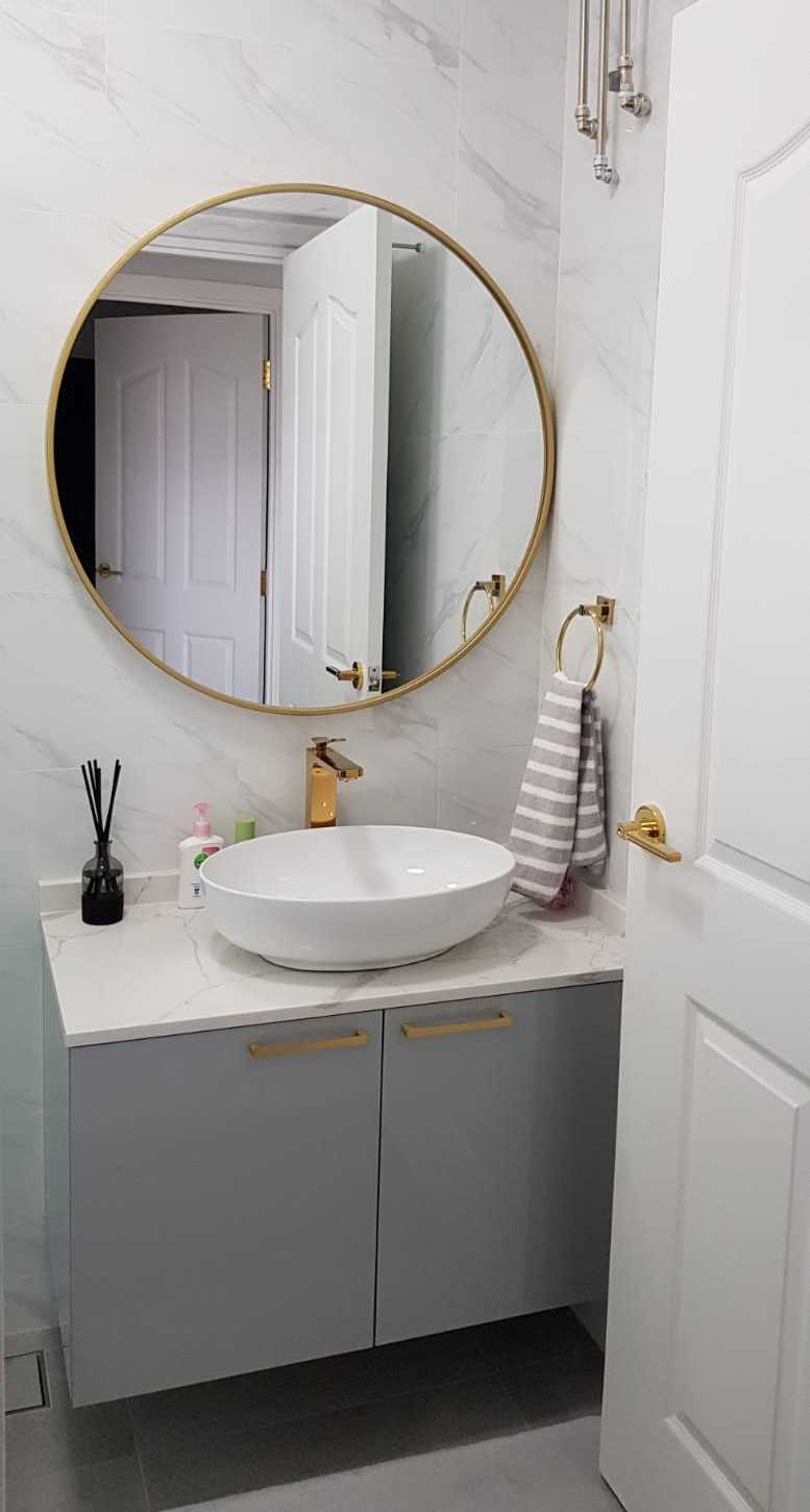 Minimalist Bathroom with Countertop and Mirror