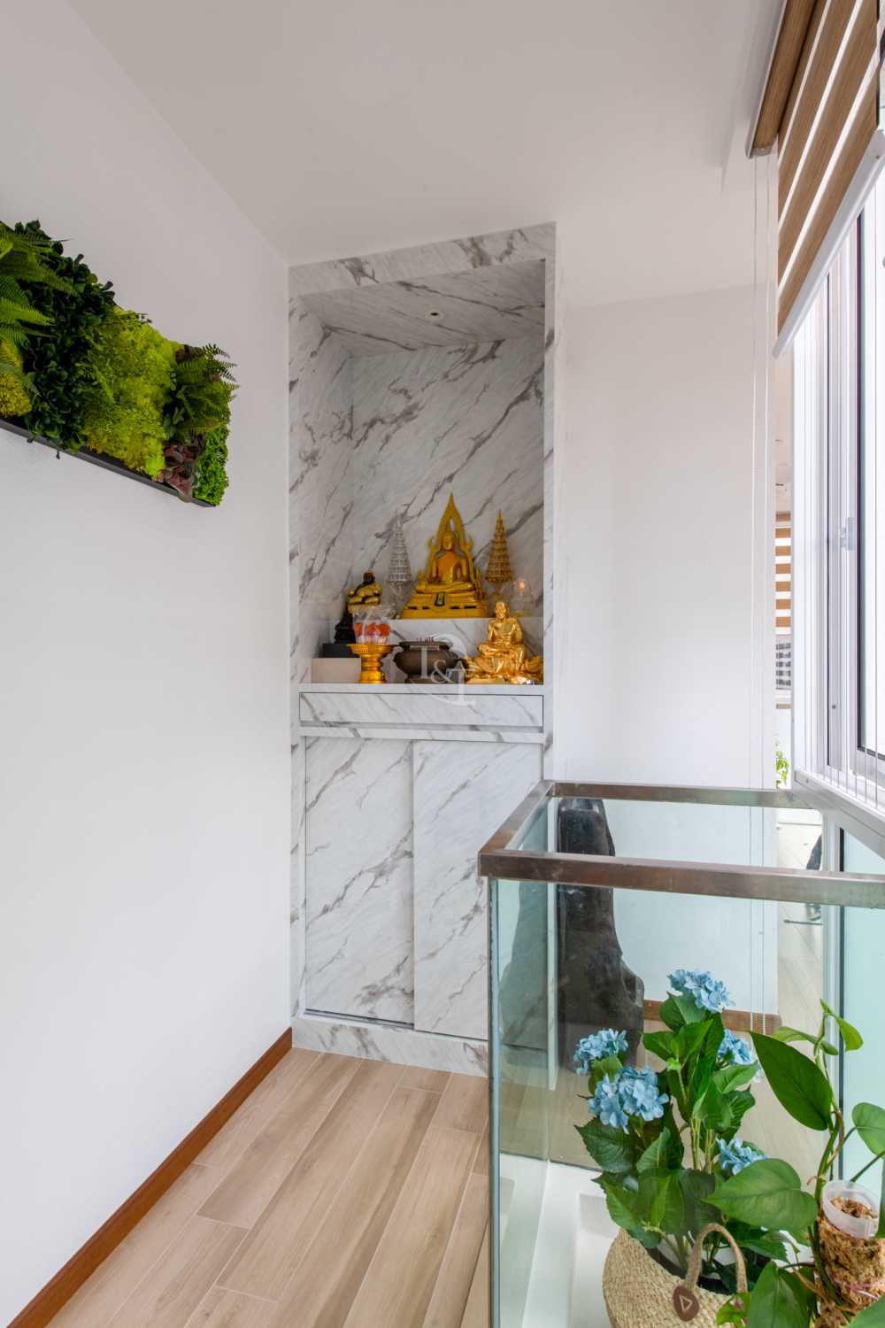 Eclectic Hallway with Wood Flooring and Feature Wall