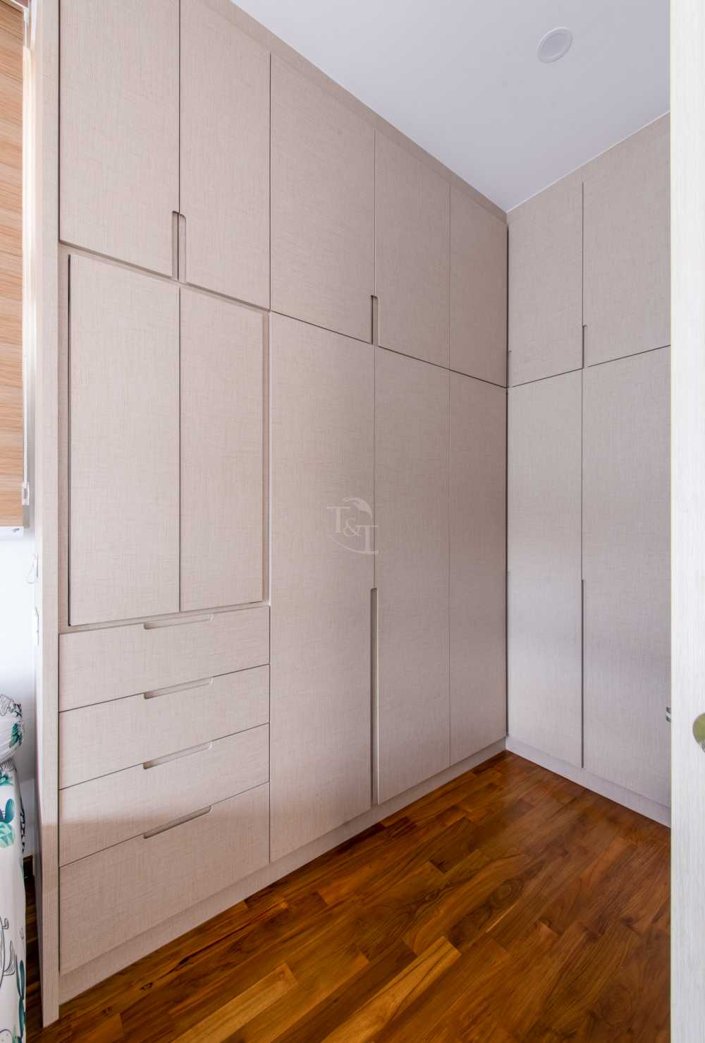 Eclectic Bedroom with Wood Flooring and Wardrobe