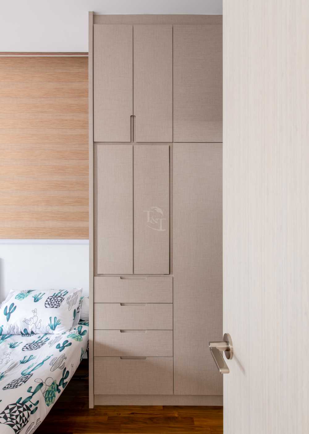Eclectic Bedroom with Wood Flooring and Feature Wall
