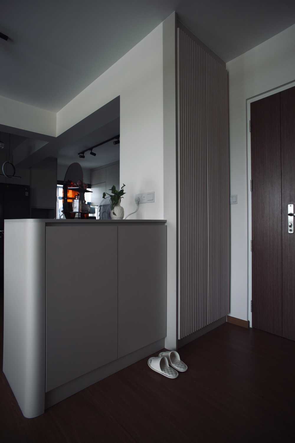 Contemporary Hallway with Bookshelf and Artwork