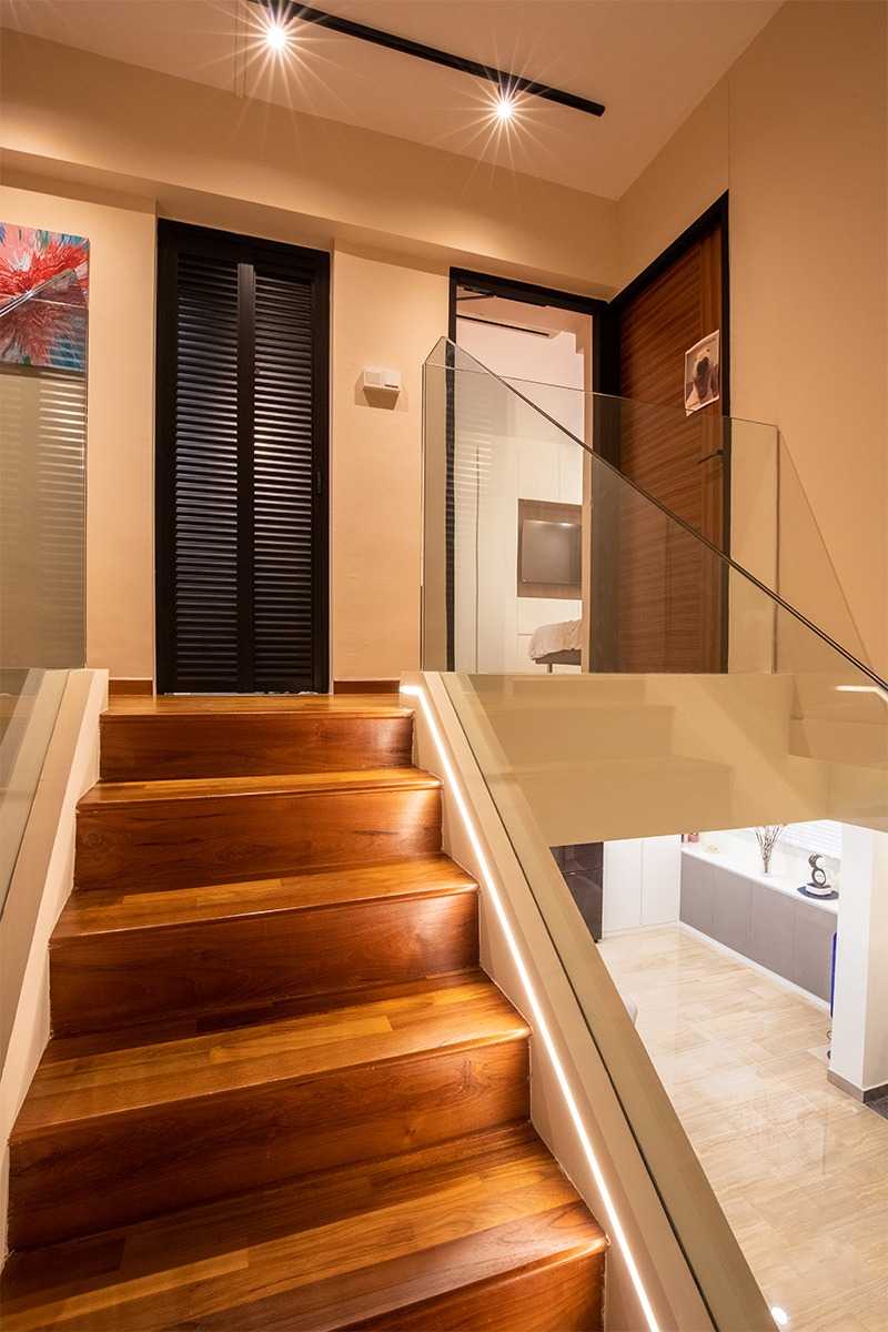 Modern Hallway with Staircase and Doors