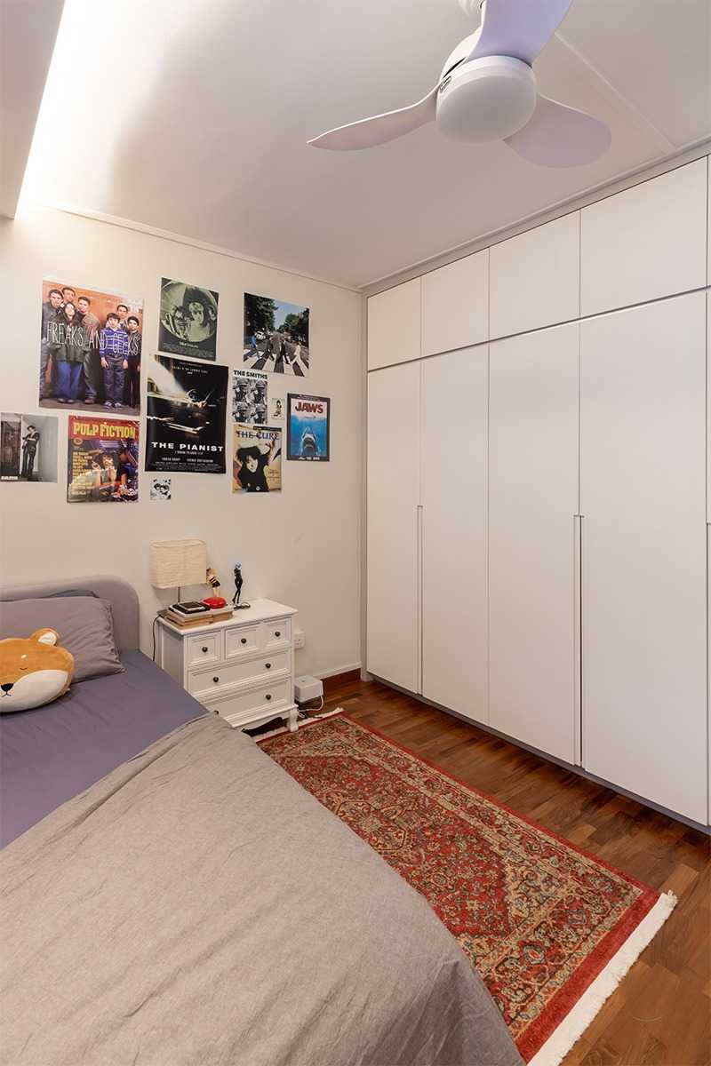 Modern Bedroom with Cove Lighting and Wardrobe