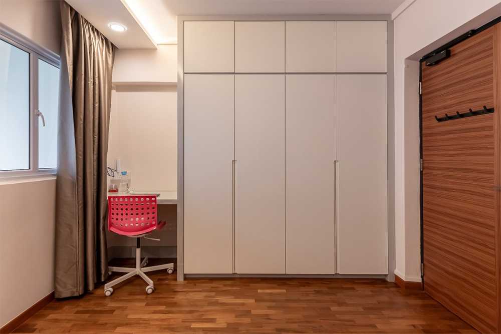 Modern Bedroom with Parquet Floor and Storage Cabinets