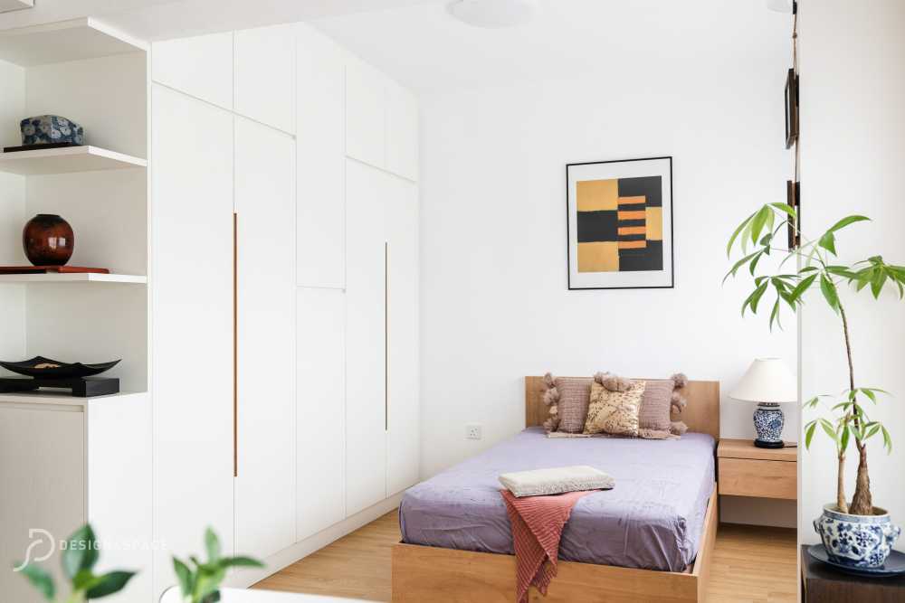 Minimalist Bedroom with Bookshelf and Closet