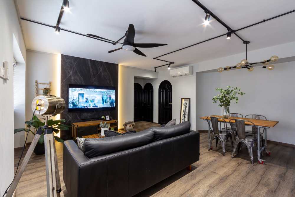 Industrial Living Room with TV Console and Drop Light