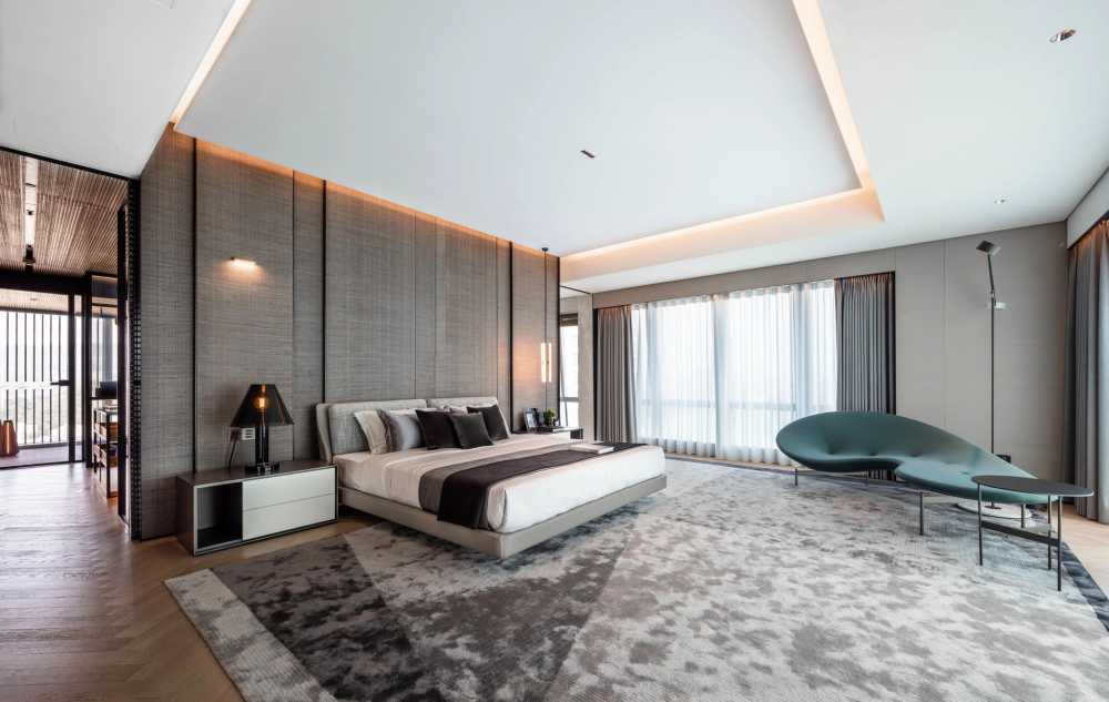 Contemporary Bedroom with Herringbone Tiling and Feature Wall