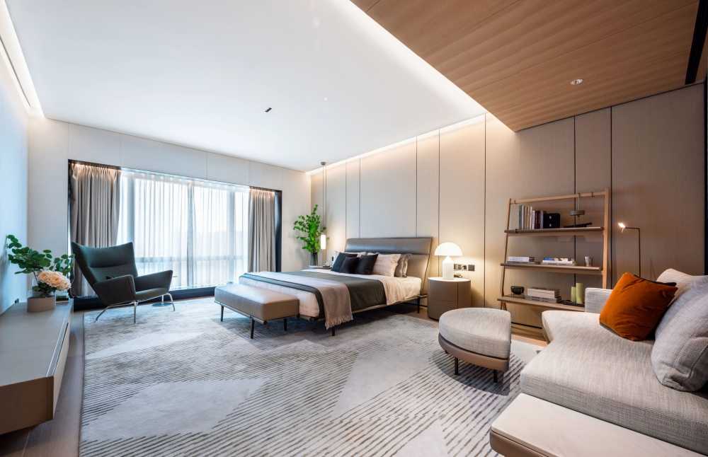 Contemporary Bedroom with Homogeneous Tiles and TV Console