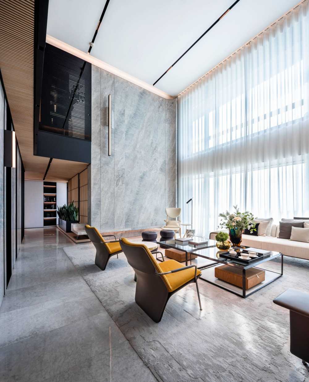 Contemporary Living Room with Bookshelf and Marble Floor