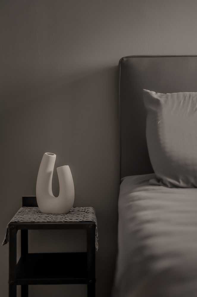 Contemporary Bedroom with Vinyl Flooring and Bedside Table