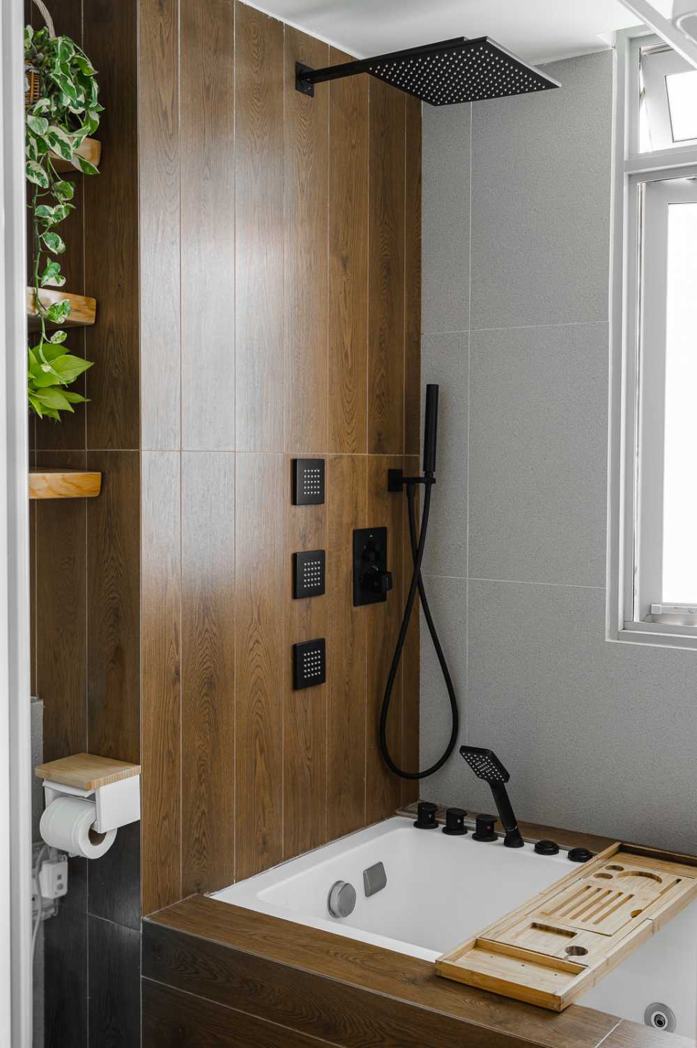 Country Bathroom with Homogeneous Tiles and Bathtub