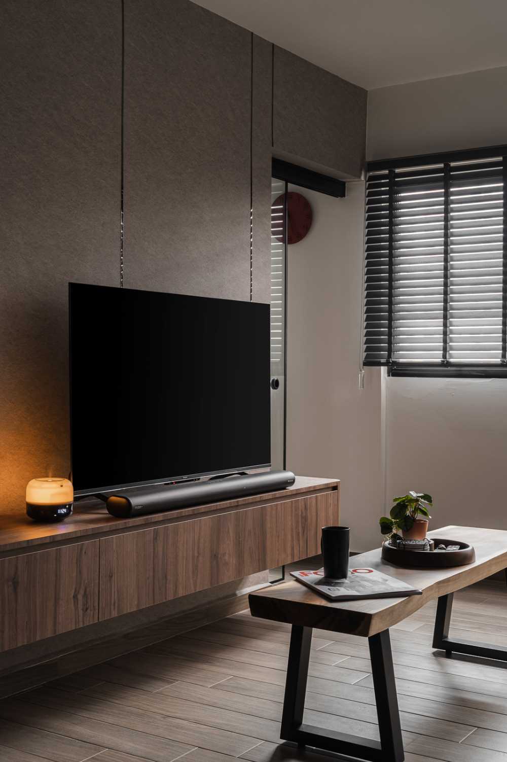 Contemporary Living Room with Feature Wall and Cove Lighting