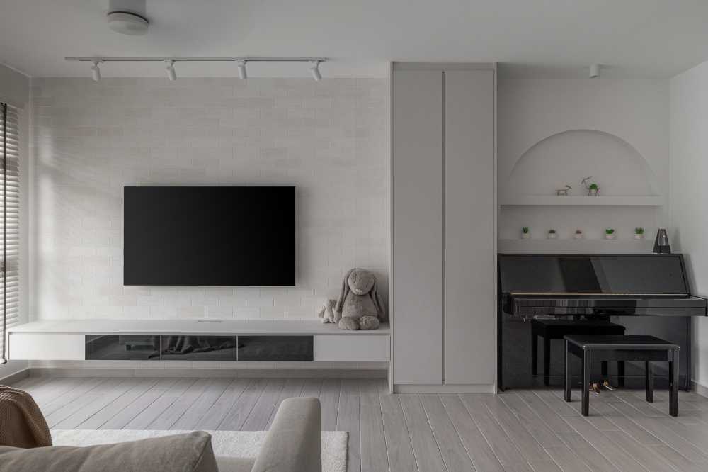 Scandinavian Living Room with Bookshelf and Feature Wall