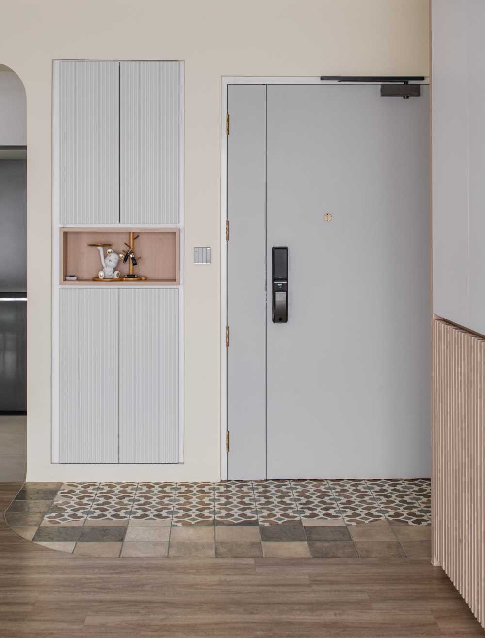 Scandinavian Entryway with Small Storage and Display Cabinets