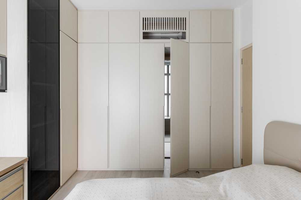 Scandinavian Bedroom with Wood Flooring and Closet