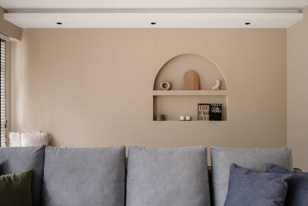Modern Living Room with Bookshelf and Feature Wall