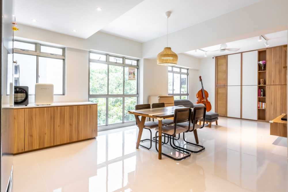 Minimalist Dining Room with Drop Light and Dining Table