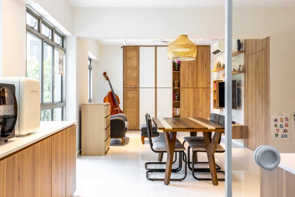 Minimalist Dining Room with Drop Light and Dining Table