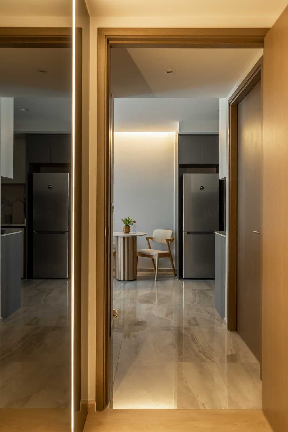 Minimalist Living Room with Homogeneous Tiles and Display Cabinets