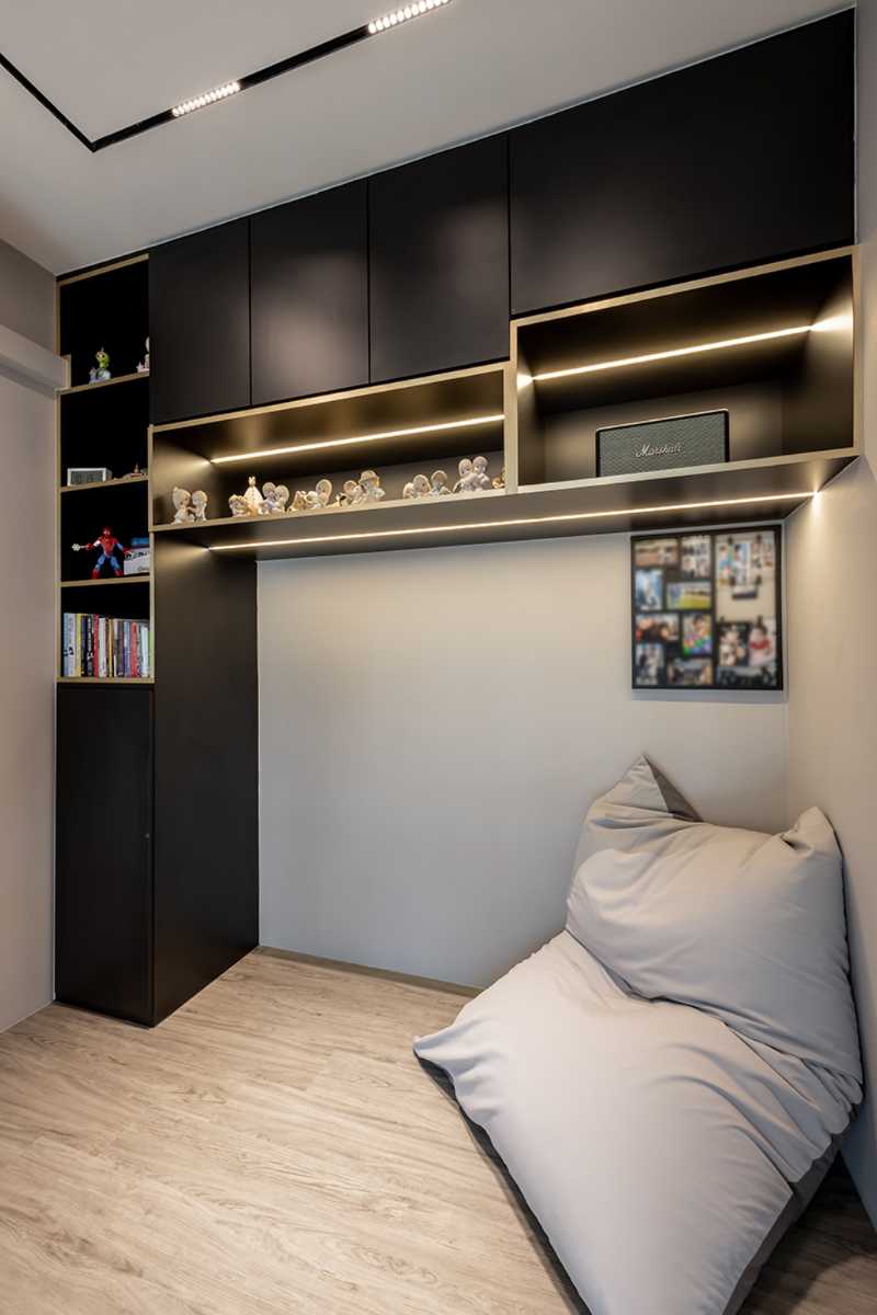 Minimalist Home Theatre with Storage Cabinets and Lighting